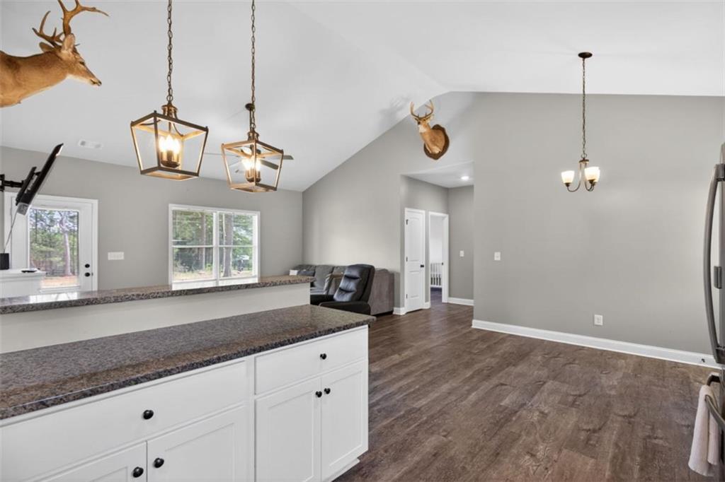 184 King Farm Road Rockmart, GA 30153 - Photo 13 of 25 a kitchen with kitchen island a counter space a sink and appliances