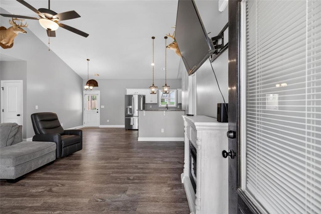 184 King Farm Road Rockmart, GA 30153 - Photo 3 of 25 a view of a living room with furniture and a chandelier