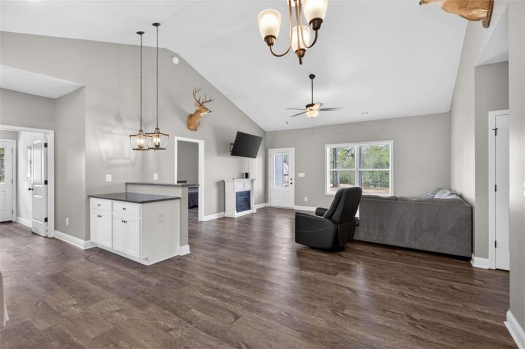 184 King Farm Road Rockmart, GA 30153 - Photo 8 of 25 a living room with furniture and wooden floor