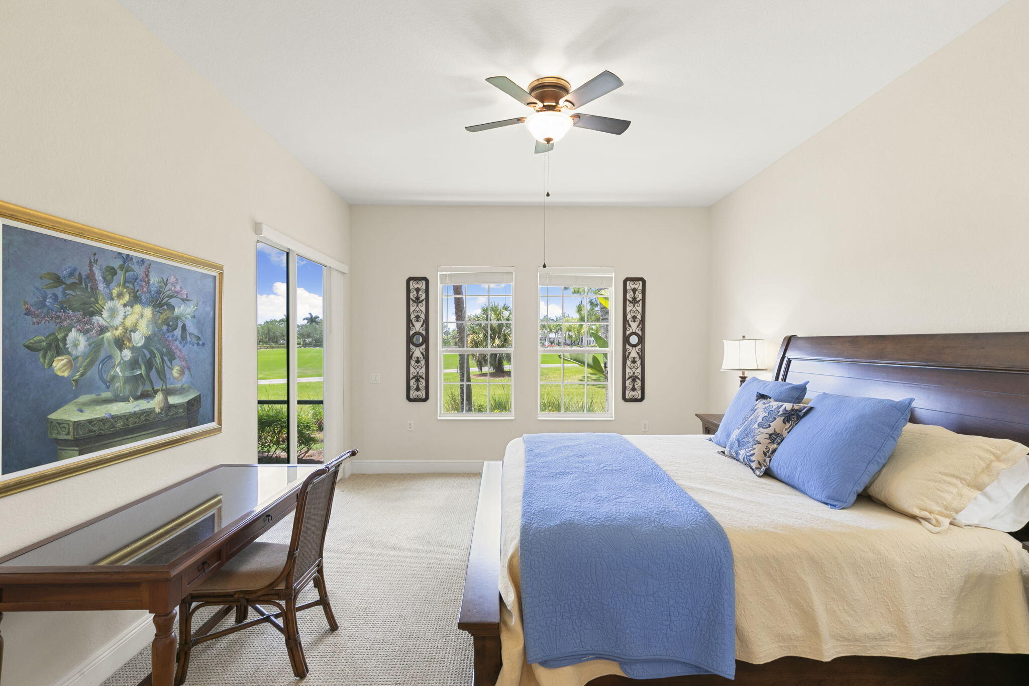 9066 Cascada Way, Unit 101 Naples, FL 34114 - Photo 17 of 51 a view of a bedroom with furniture window and outside view