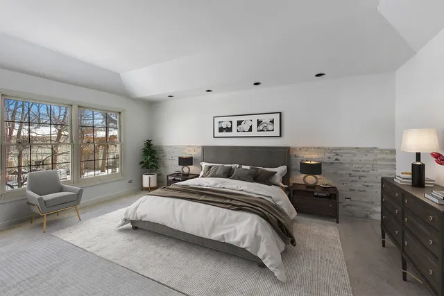 a bathroom with a granite countertop sink a toilet a mirror and bathtub