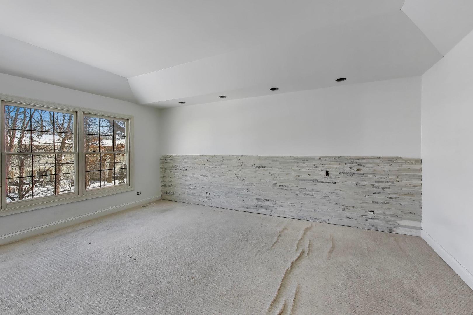 309 Ridge Road Highland Park, IL 60035 - Photo 32 of 71 a view of an empty room with a window