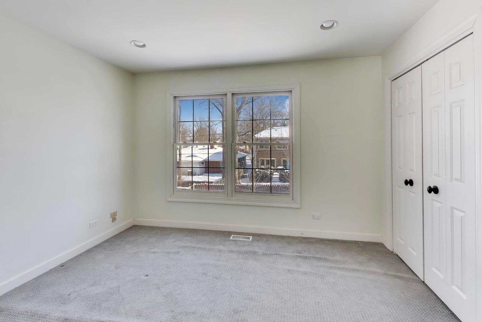 309 Ridge Road Highland Park, IL 60035 - Photo 49 of 71 a view of an empty room with a window