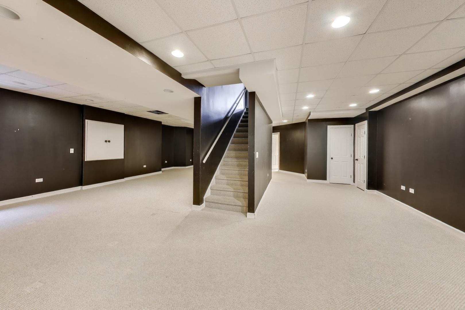 309 Ridge Road Highland Park, IL 60035 - Photo 54 of 71 a view of an empty room with a window