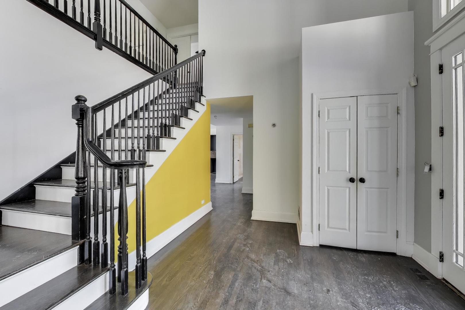 309 Ridge Road Highland Park, IL 60035 - Photo 6 of 71 a view of entryway with wooden floor and stairs