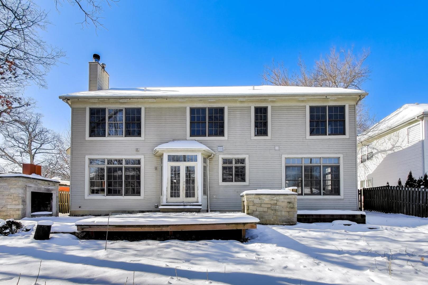 309 Ridge Road Highland Park, IL 60035 - Photo 65 of 71 a front view of a house with a yard