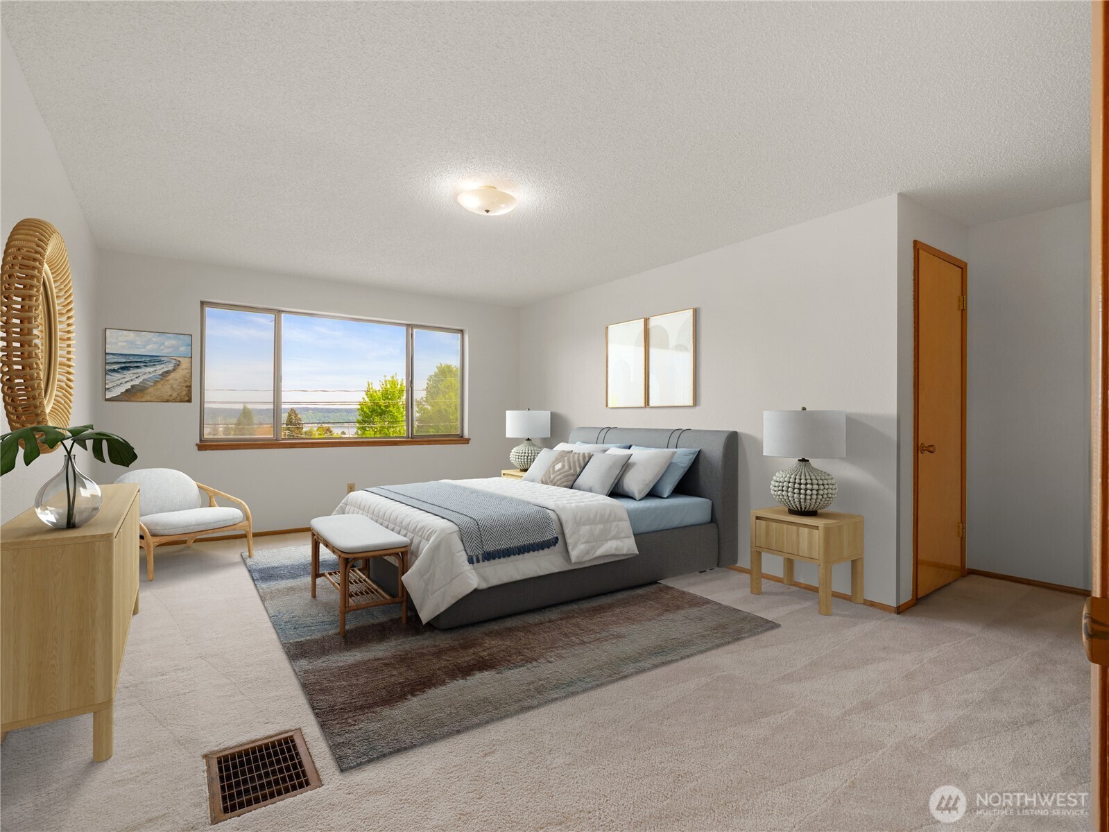 5704 North Ruby Street Tacoma, WA 98407 - Photo 19 of 38 a spacious bedroom with a large bed and a couch