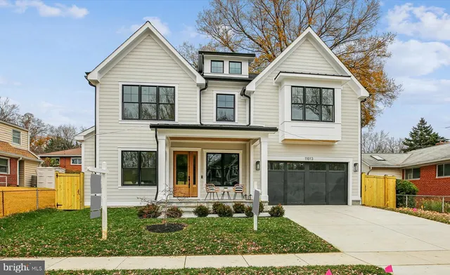 a front view of a house with yard