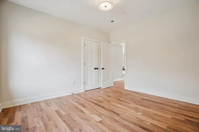 a utility room with sink dryer and washer