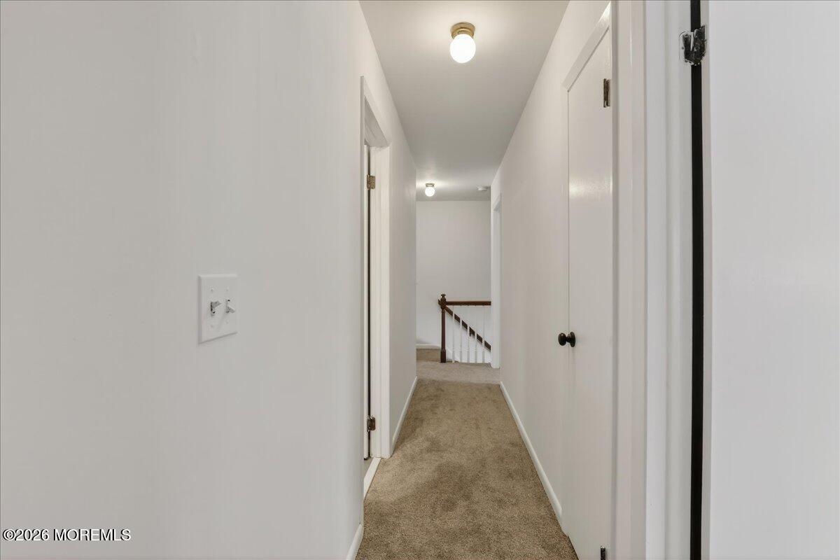 380 Schanck Road Freehold, NJ 07728 - Photo 21 of 42 21-Upper Hallway