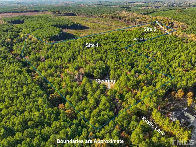 a view of a lake with top of house