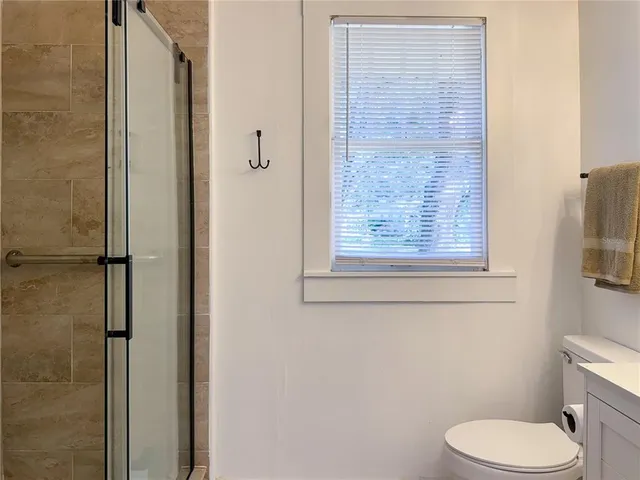 a view of swimming pool with porch and yard