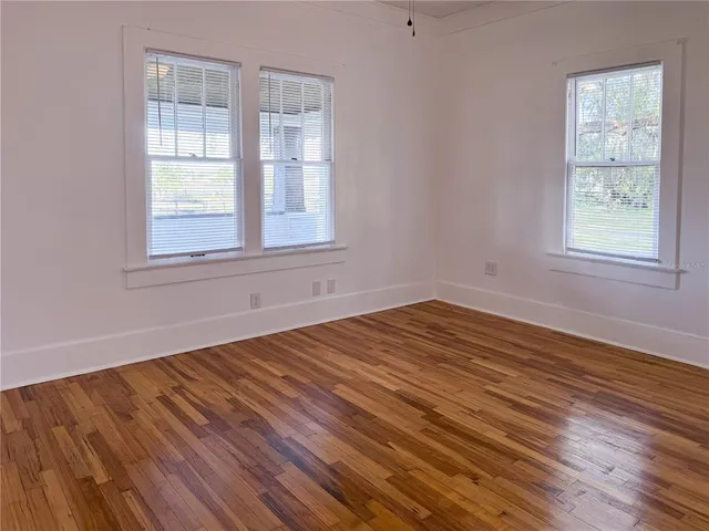 a view of a door and a window