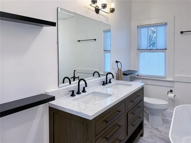 a front view of a house with a balcony