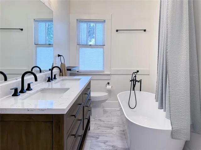 a view of a swimming pool with a lounge chairs