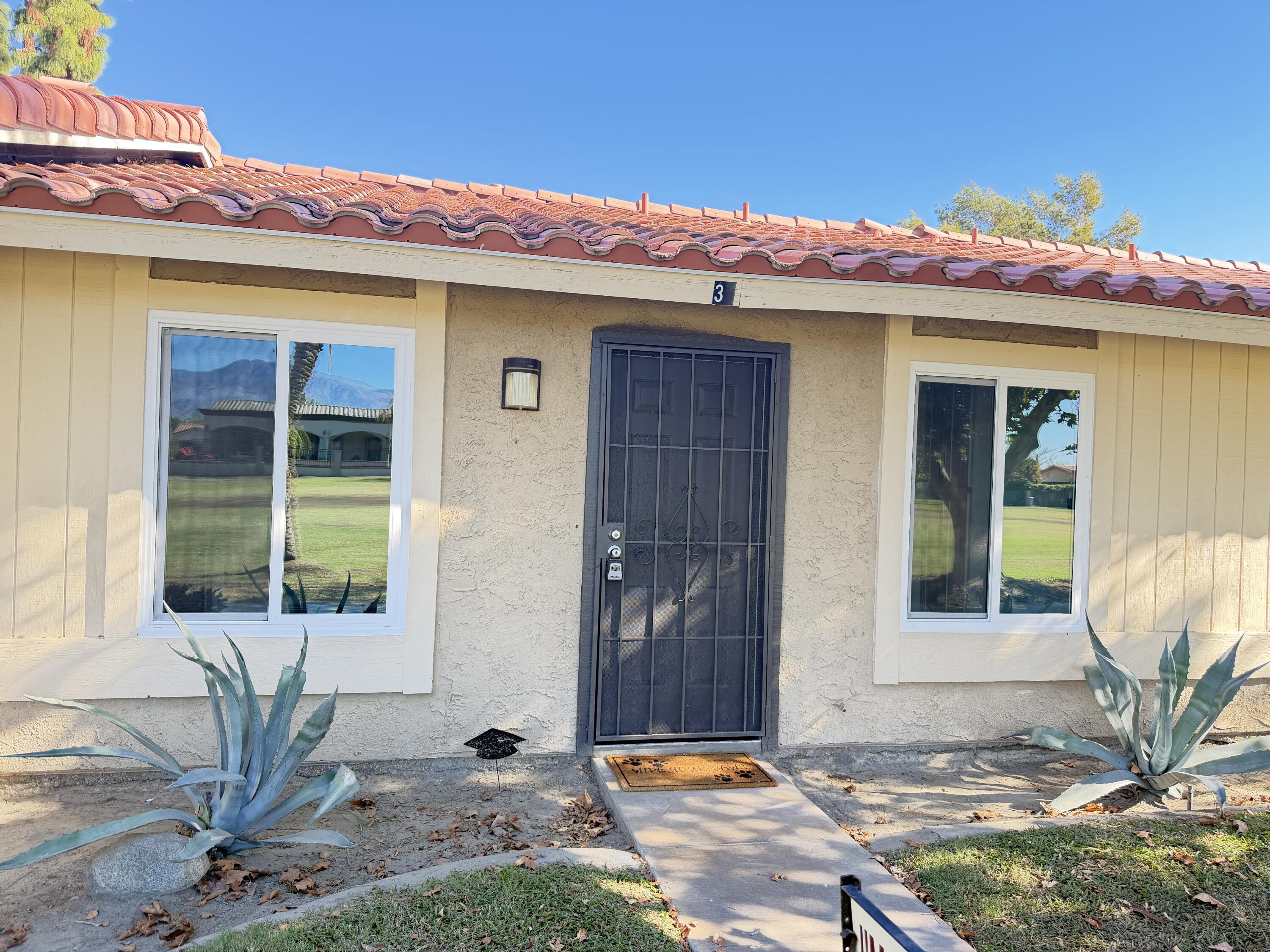 82567 Ave 48, Unit 36 Indio, CA 92201 - Photo 16 of 27 a front view of a house