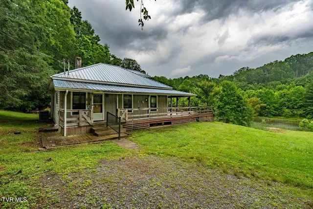 $894,000 | 306 Bear Branch Road, Roan Mountain, TN 37687