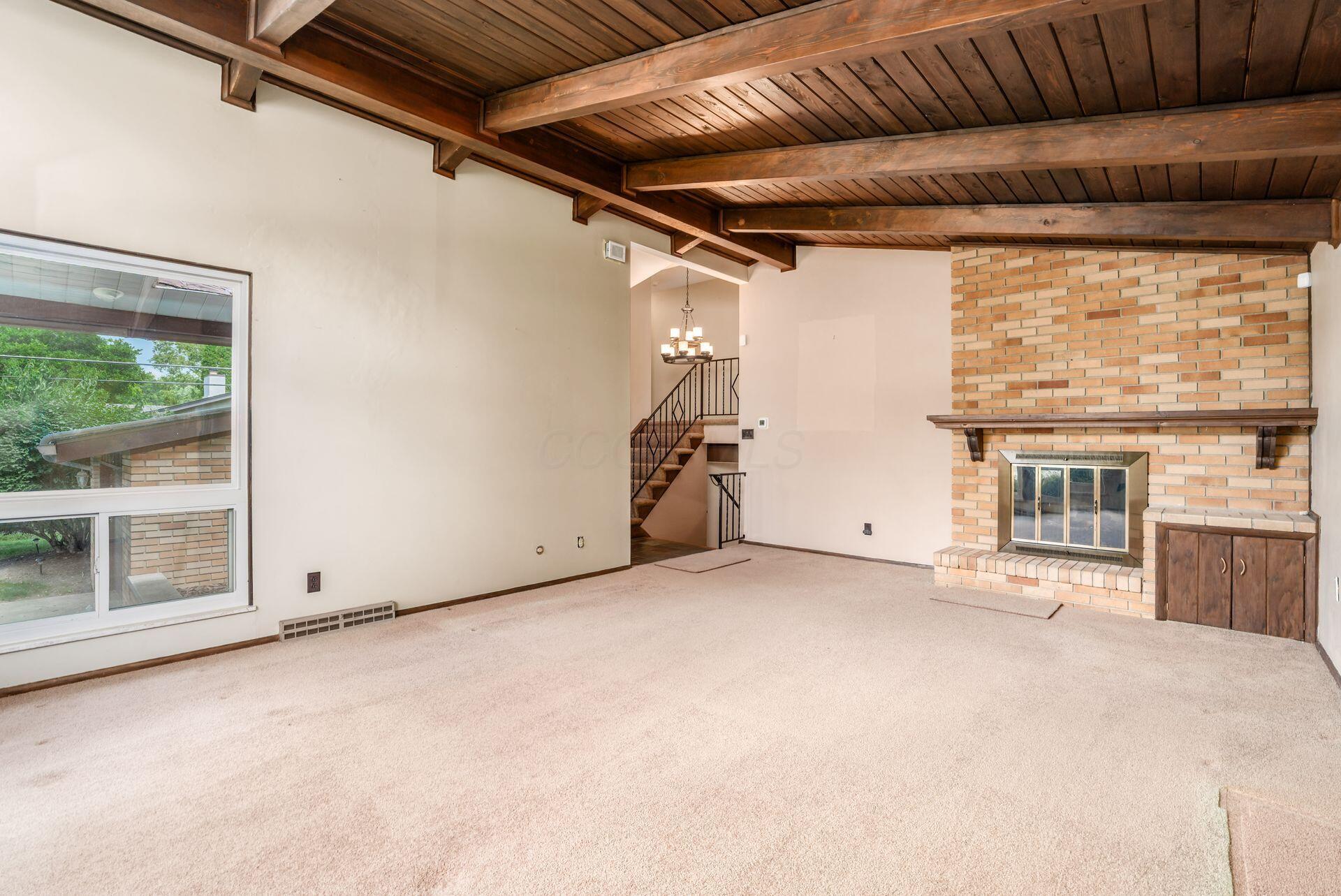 3419 Ridgewood Drive Hilliard, OH 43026 - Photo 7 of 51 Living Room with wood beams & ceiling