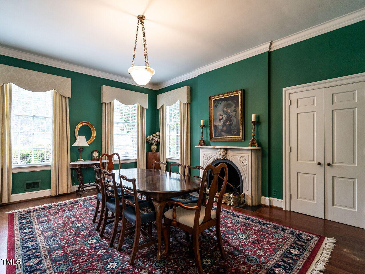1930 Reid Street Raleigh, NC 27608 - Photo 9 of 31 a view of a dining room with furniture window and wooden floor