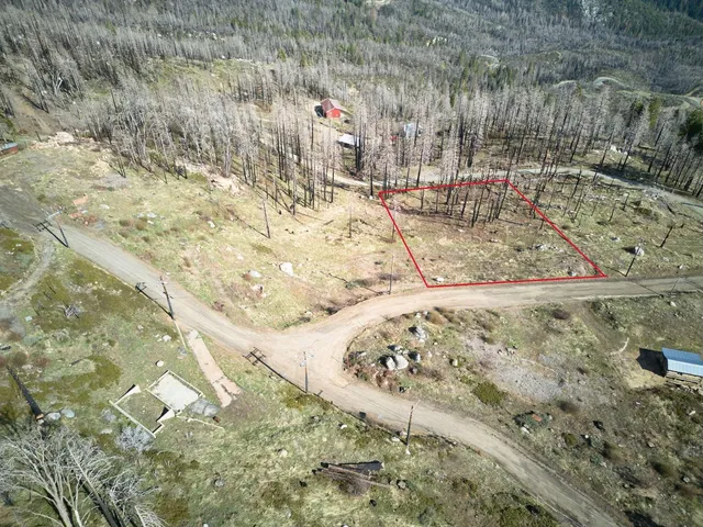 a view of a backyard of a house