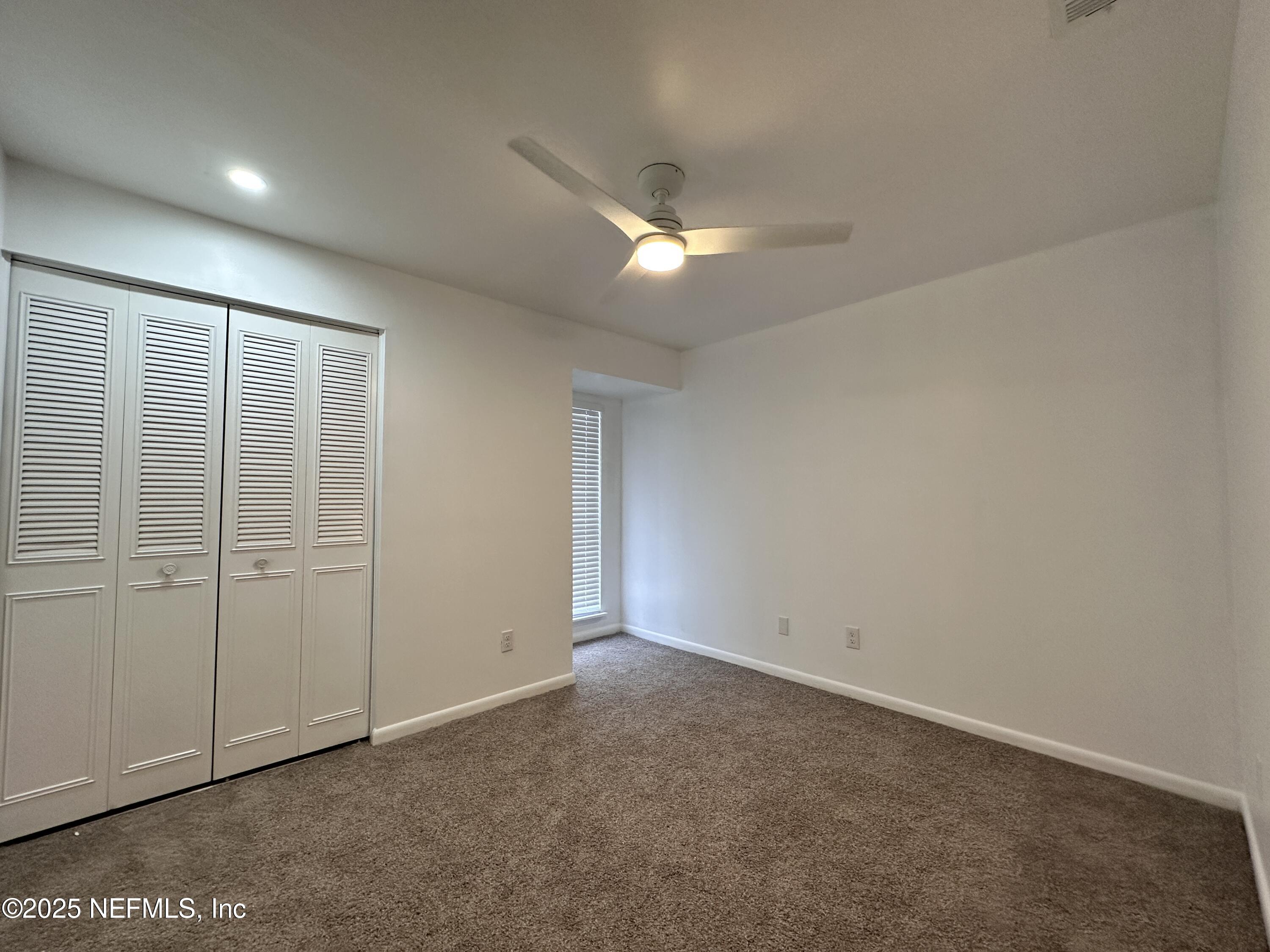 2538 Green Spring Drive Jacksonville, FL 32246 - Photo 10 of 15 an empty room with closet area