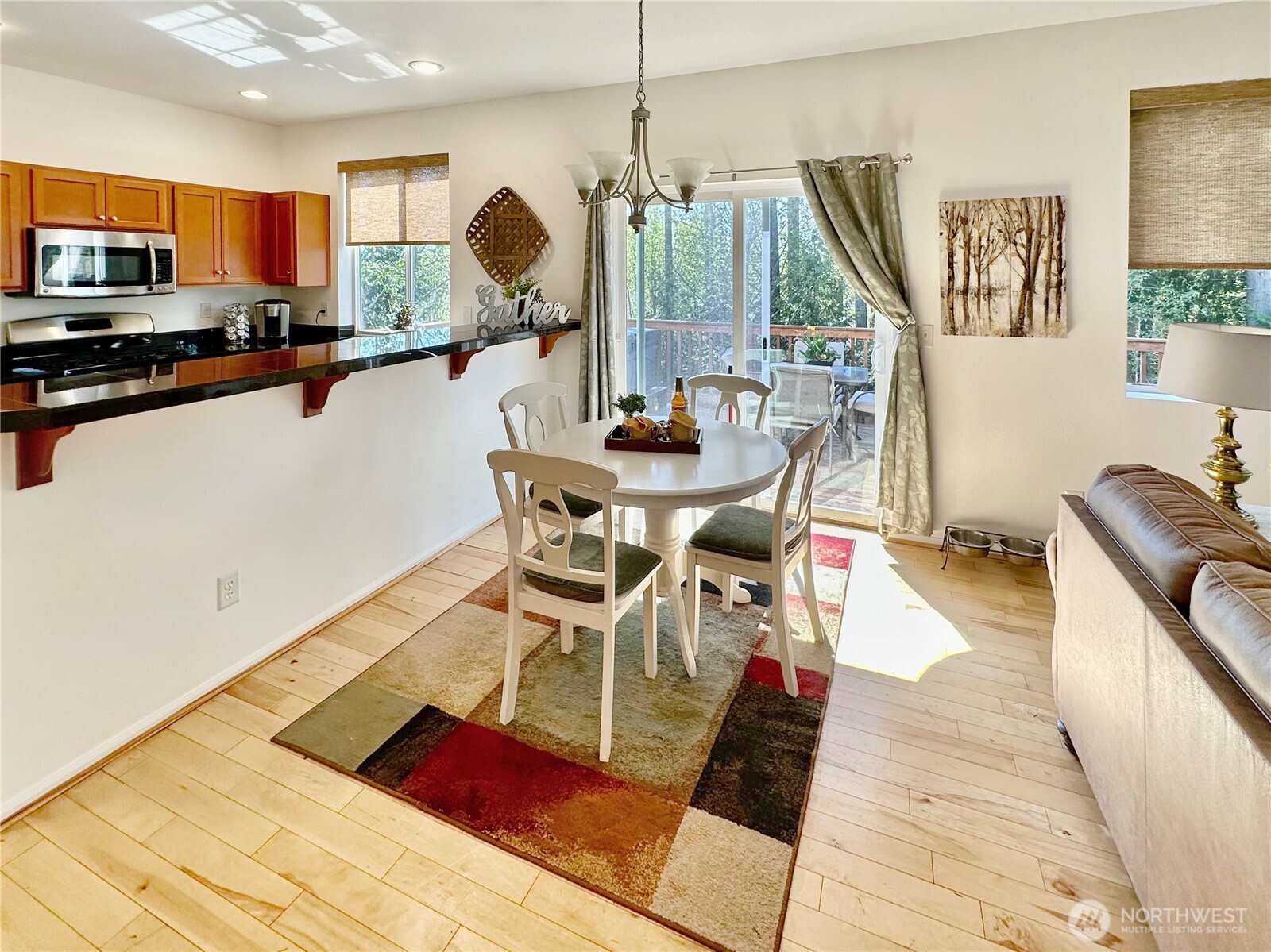 1348 Ebbets Drive Tumwater, WA 98512 - Photo 13 of 37 a view of a dining room with furniture