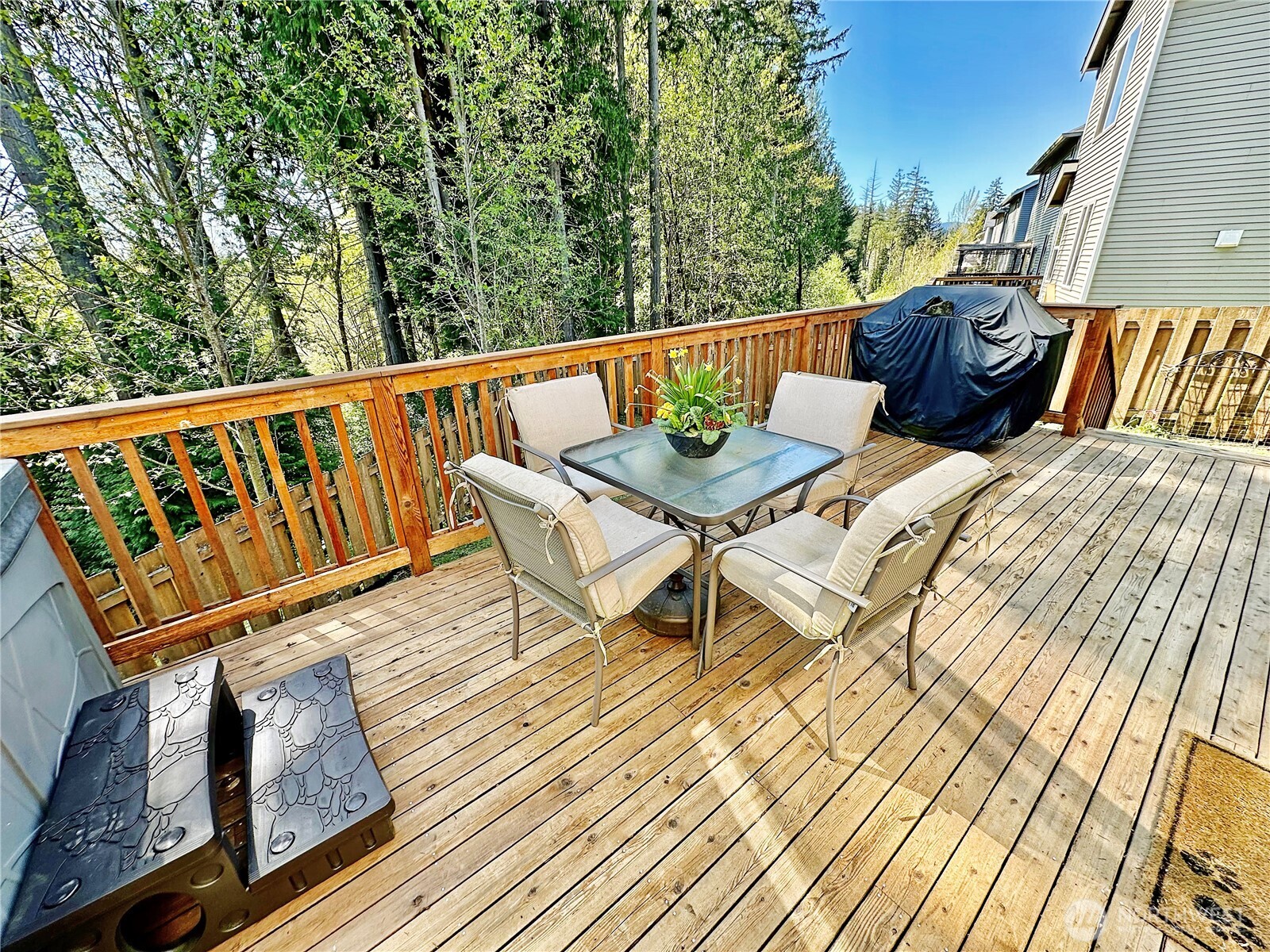 1348 Ebbets Drive Tumwater, WA 98512 - Photo 16 of 37 a roof deck with couches and wooden floor