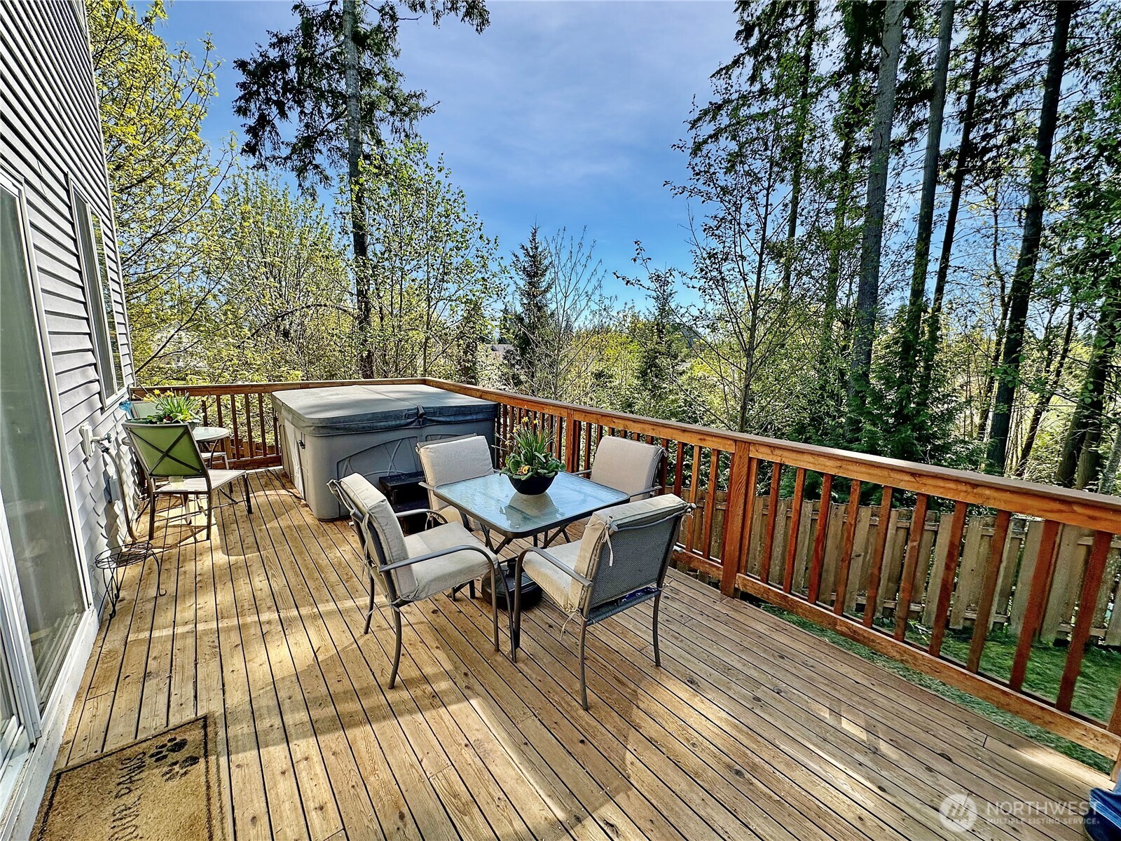 1348 Ebbets Drive Tumwater, WA 98512 - Photo 17 of 37 a view of a chairs and table on the wooden floor