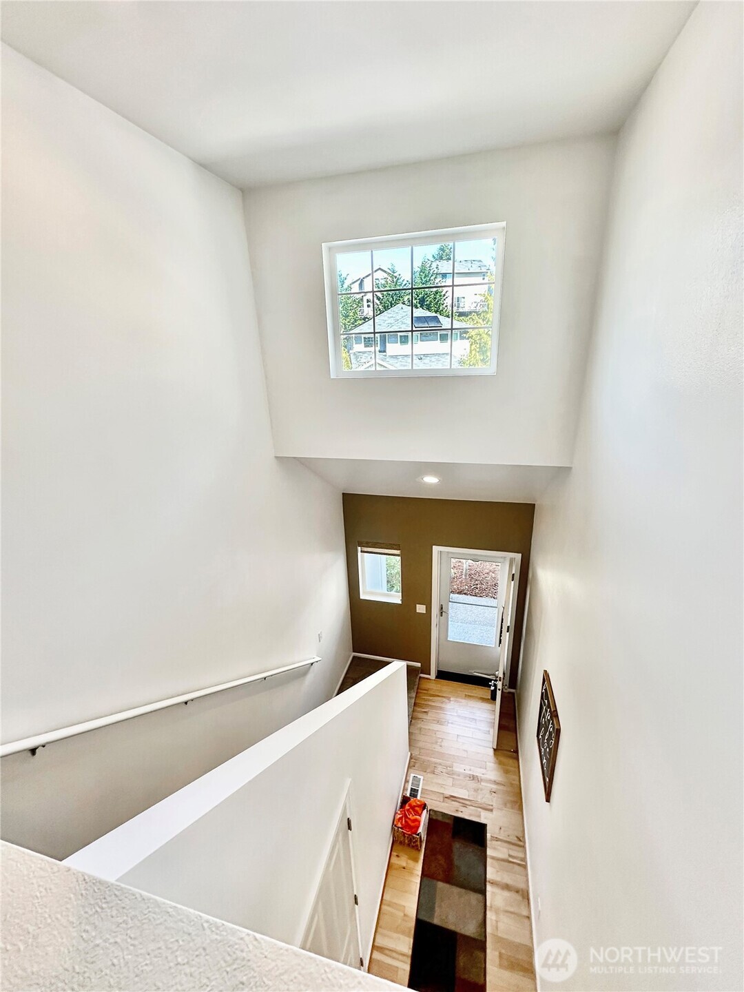 1348 Ebbets Drive Tumwater, WA 98512 - Photo 35 of 37 a view of room with window and wooden floor