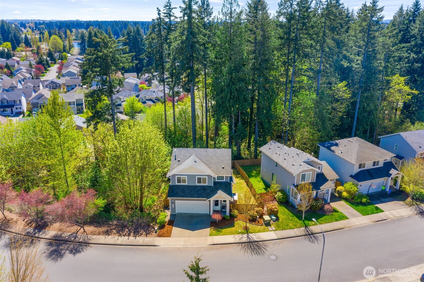 1348 Ebbets Drive Tumwater, WA 98512 - Photo 36 of 37 an aerial view of a house with a garden and outdoor seating