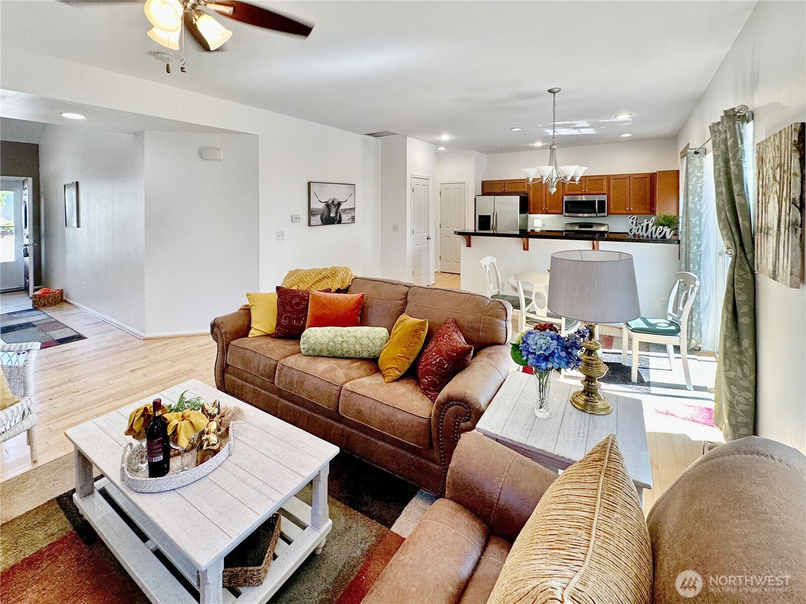 1348 Ebbets Drive Tumwater, WA 98512 - Photo 7 of 37 a living room with furniture and kitchen view