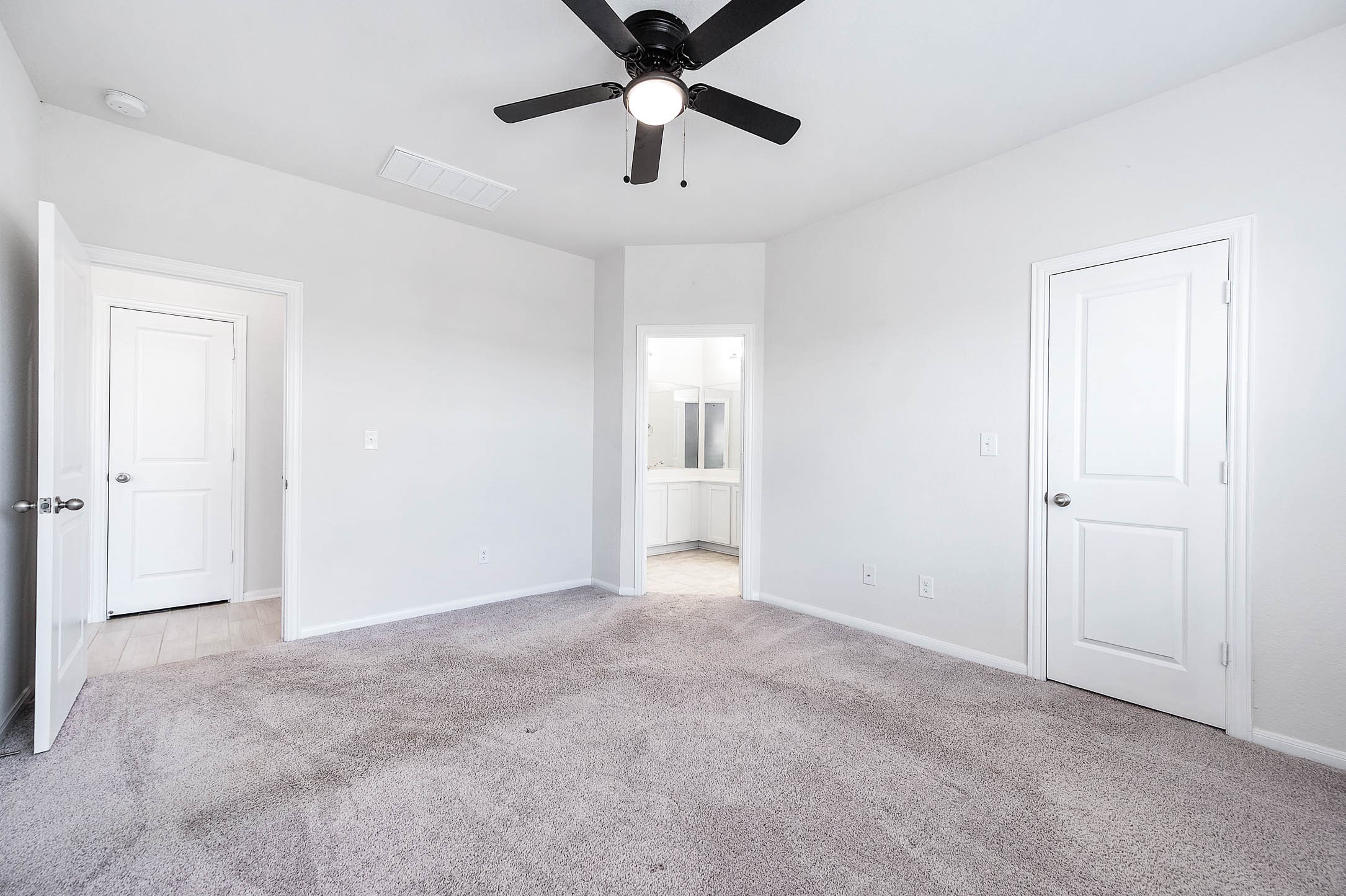3611 Prairie Rose Trail Angleton, TX 77515 - Photo 19 of 25 a view of an empty room and chandelier fan