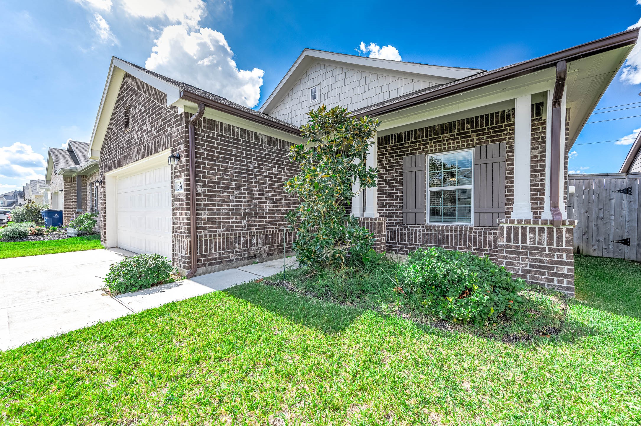3611 Prairie Rose Trail Angleton, TX 77515 - Photo 2 of 25 a view of backyard with potted plants and wooden fence