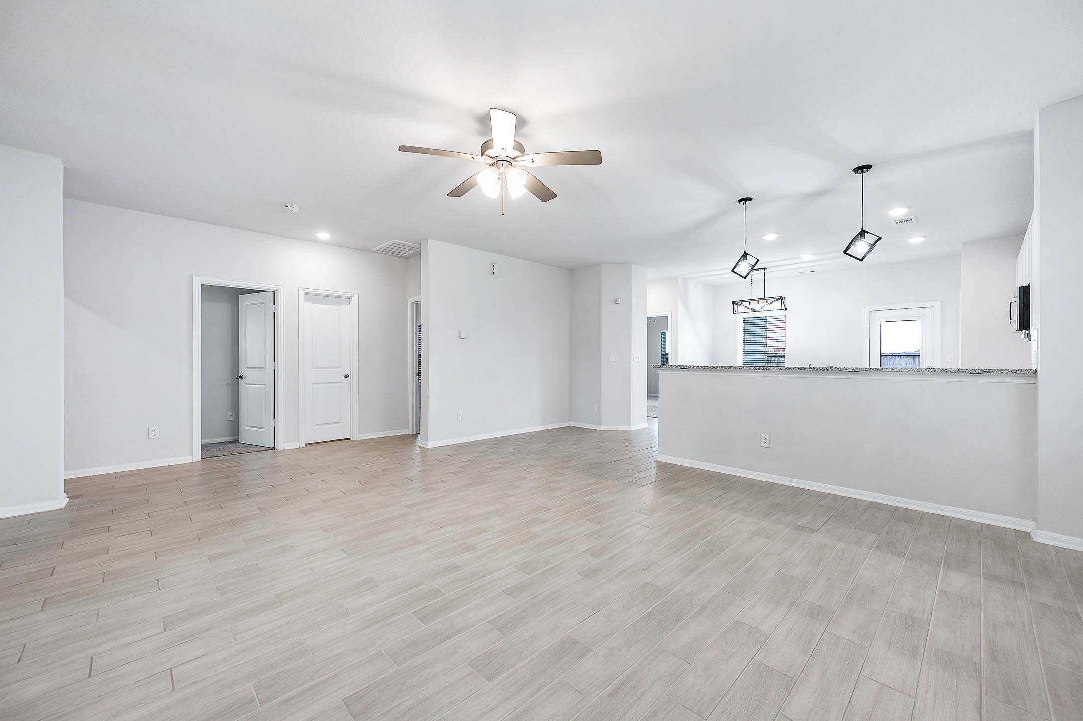 3611 Prairie Rose Trail Angleton, TX 77515 - Photo 7 of 25 a view of an empty room with a window