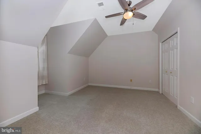 a view of a pathway with a backyard