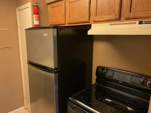 a close view of a stove and kitchen