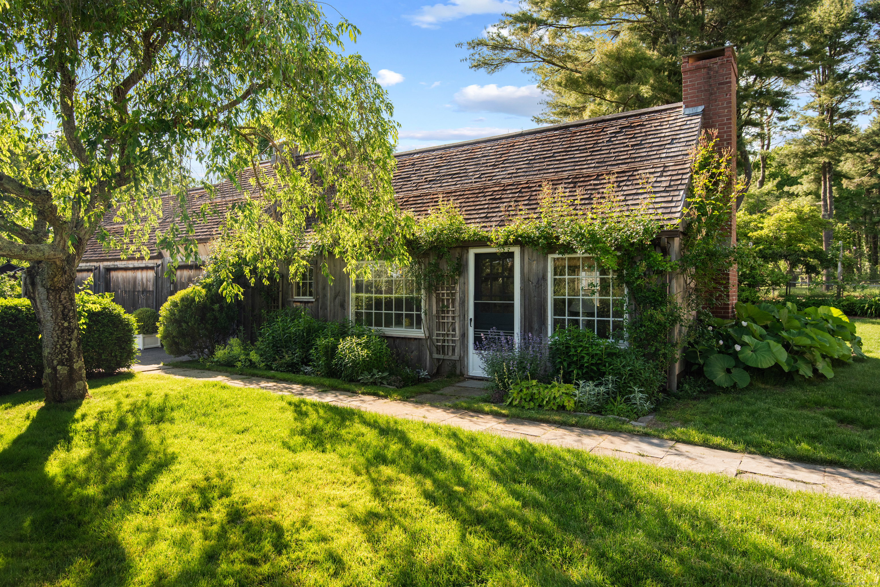 53-1 Selden Road Lyme, CT 06371 - Photo 20 of 40 Three bay detached garage with self-sufficient 1bed/1bath guest quarters.