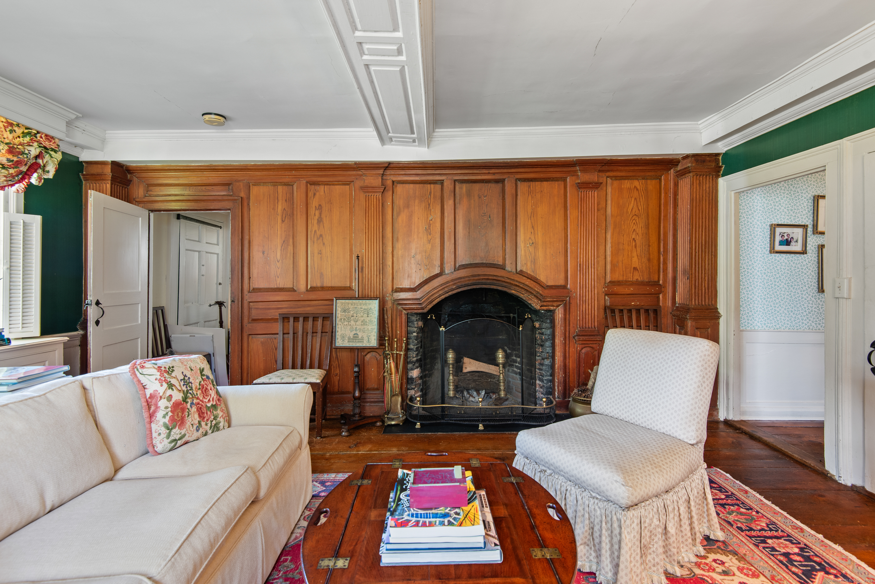 53-1 Selden Road Lyme, CT 06371 - Photo 5 of 40 Superb period wood paneling adorns the library fireplace wall.