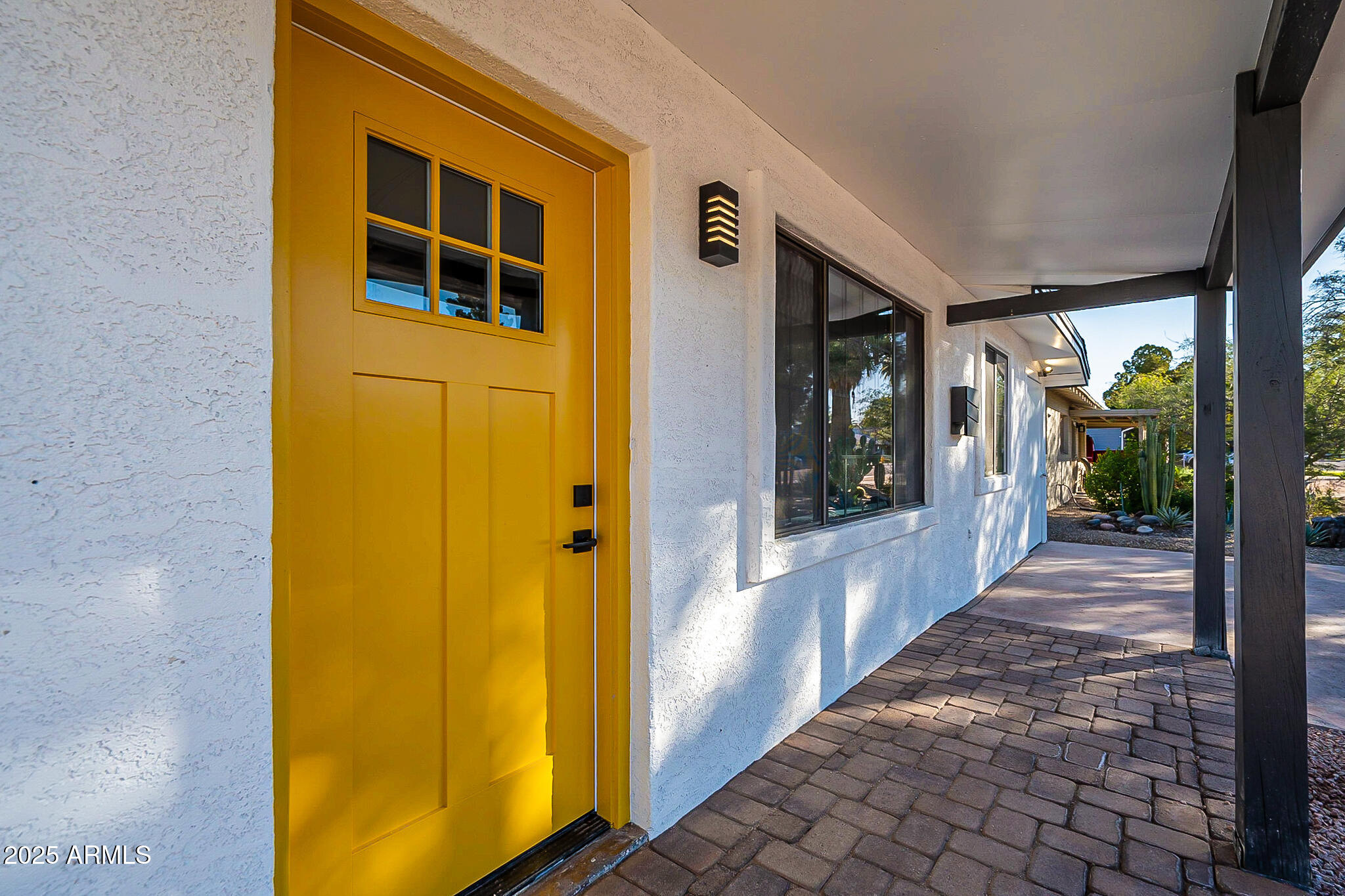 1316 East Lemon Street Tempe, AZ 85281 - Photo 2 of 43 a view of a brick house with windows