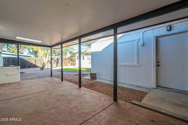 a view of an empty room and window