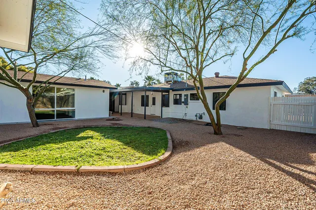 a view of a house with a swimming pool