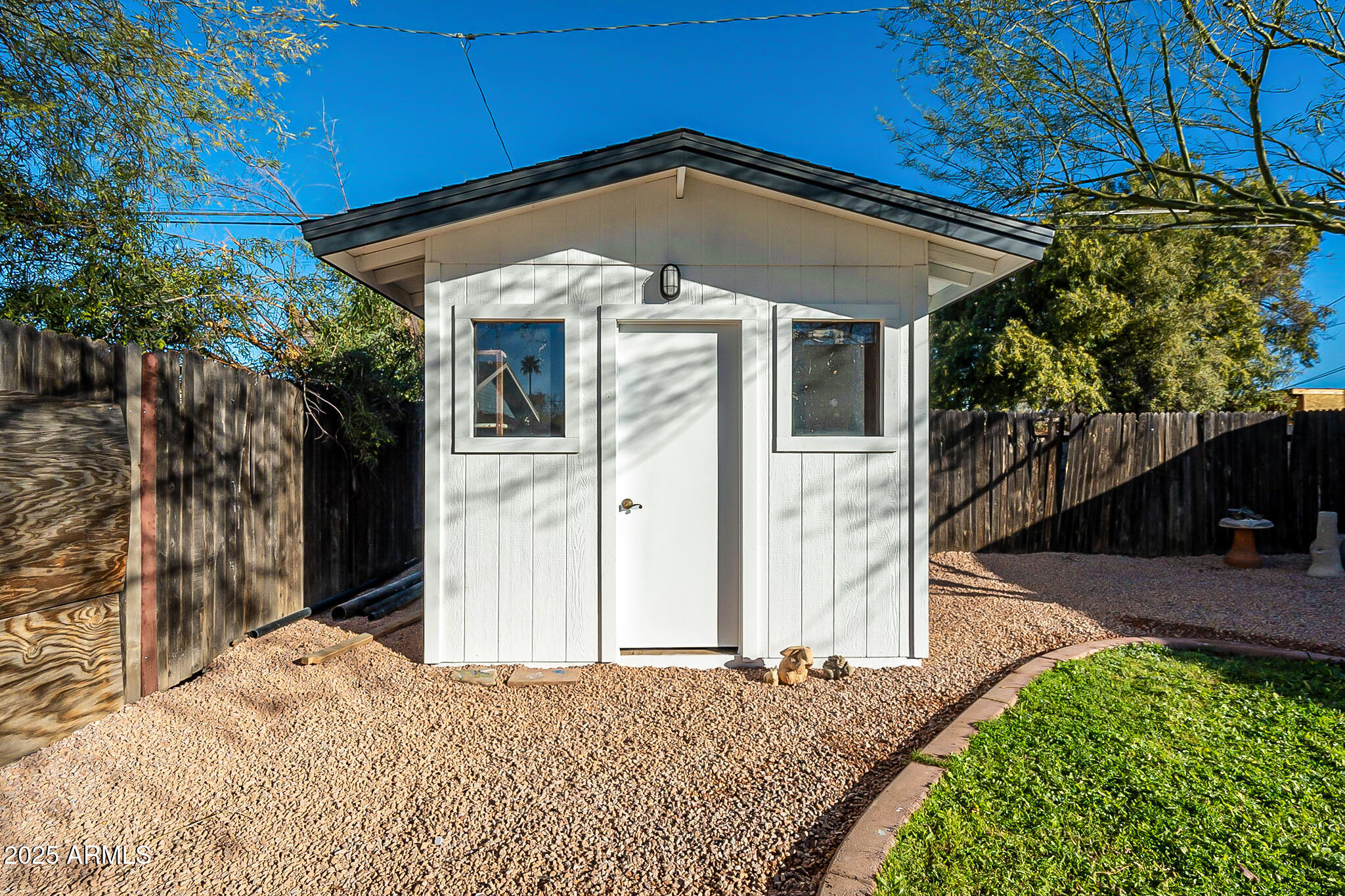 1316 East Lemon Street Tempe, AZ 85281 - Photo 42 of 43 a front view of a house with a yard