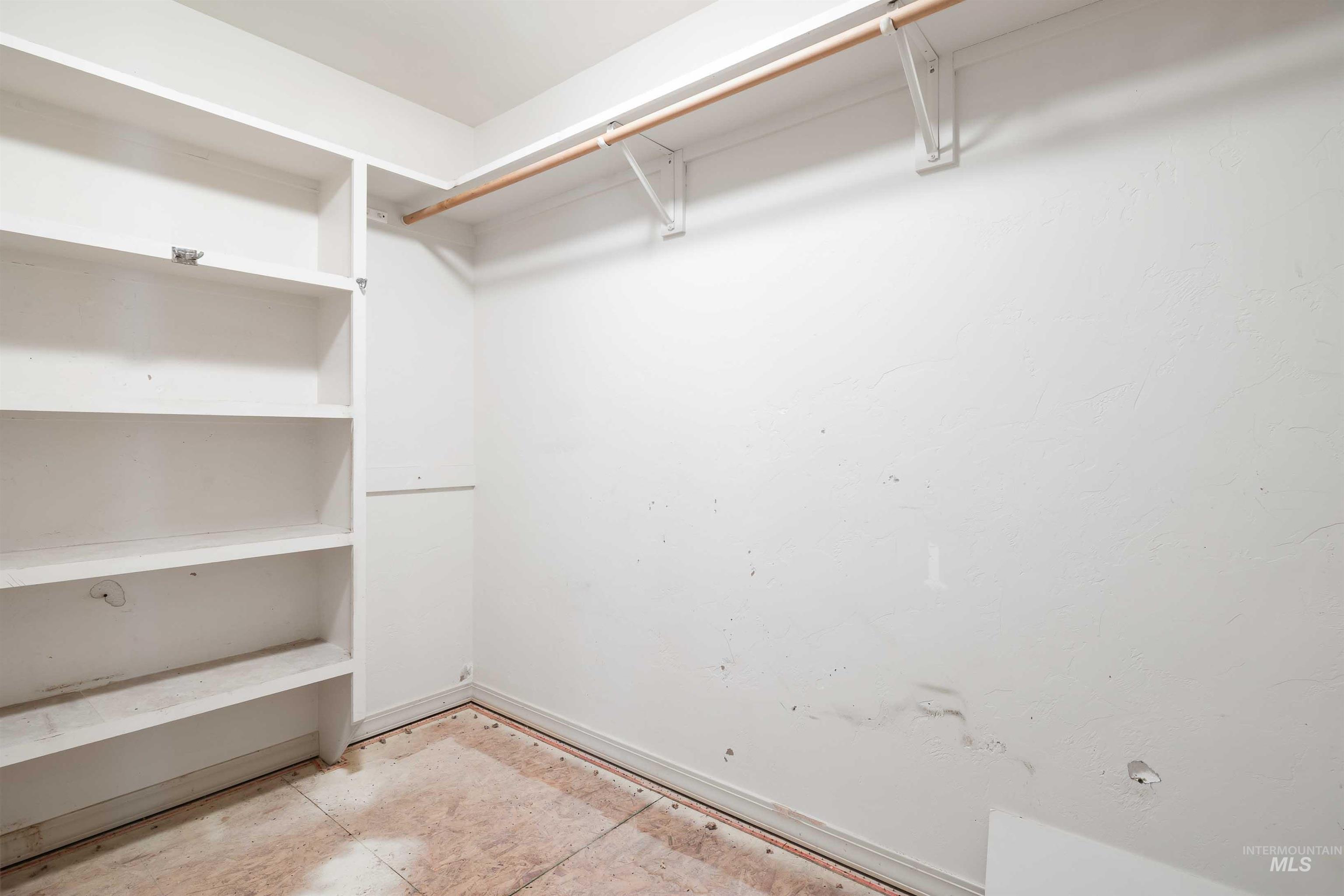 2509 Cedar Ridge Road Twin Falls, ID 83301 - Photo 11 of 36 Built-in shelving with hanging rod