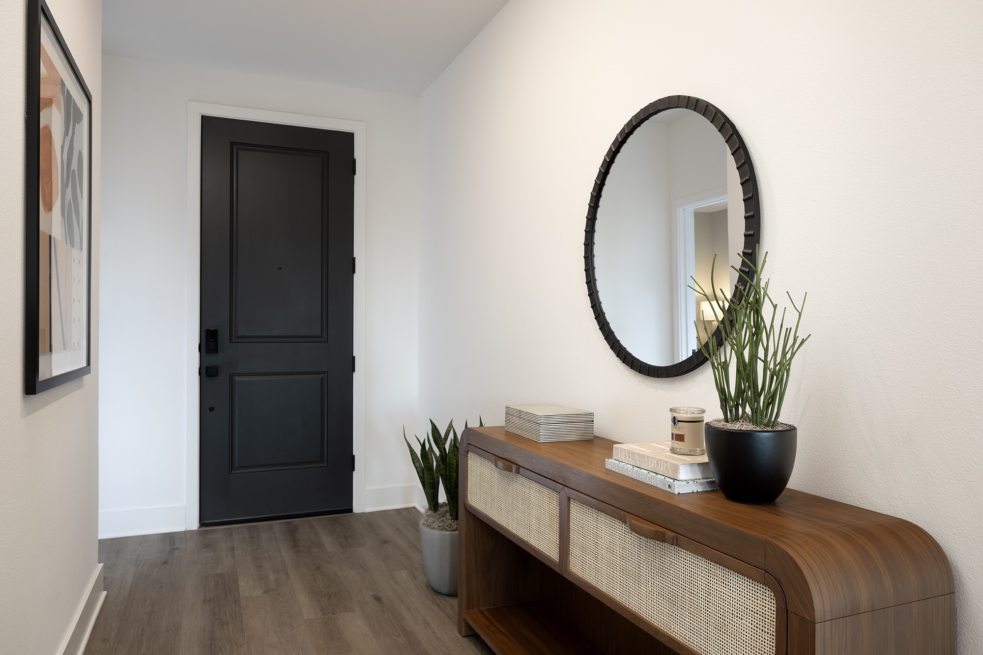270 Romans Road Kyle, TX 78640 - Photo 15 of 23 a room with a mirror and a wooden floor