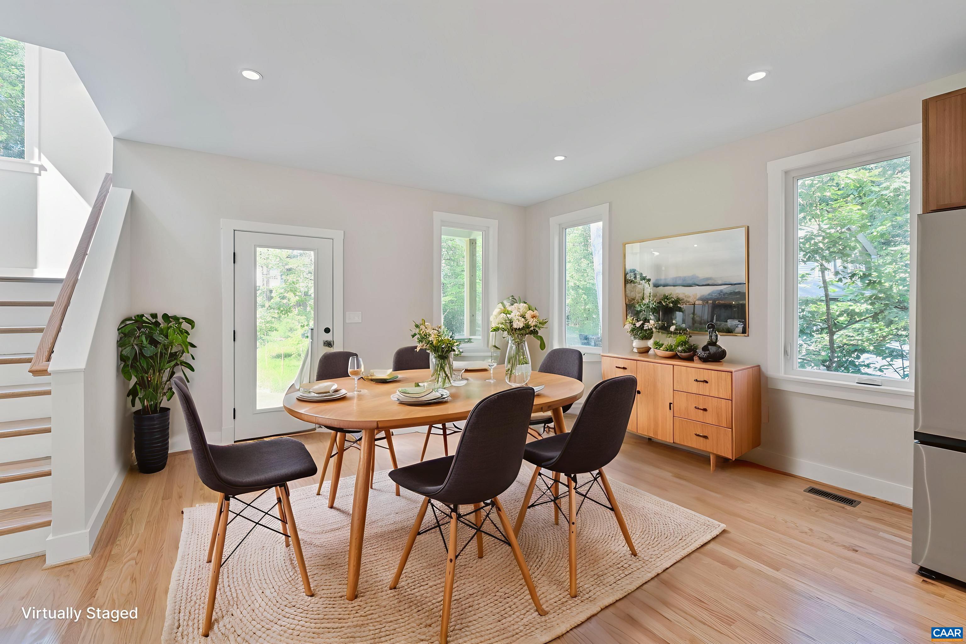 34 Turkeysag Trail Palmyra, VA 22963 - Photo 11 of 53 a view of a dining room with furniture window and wooden floor