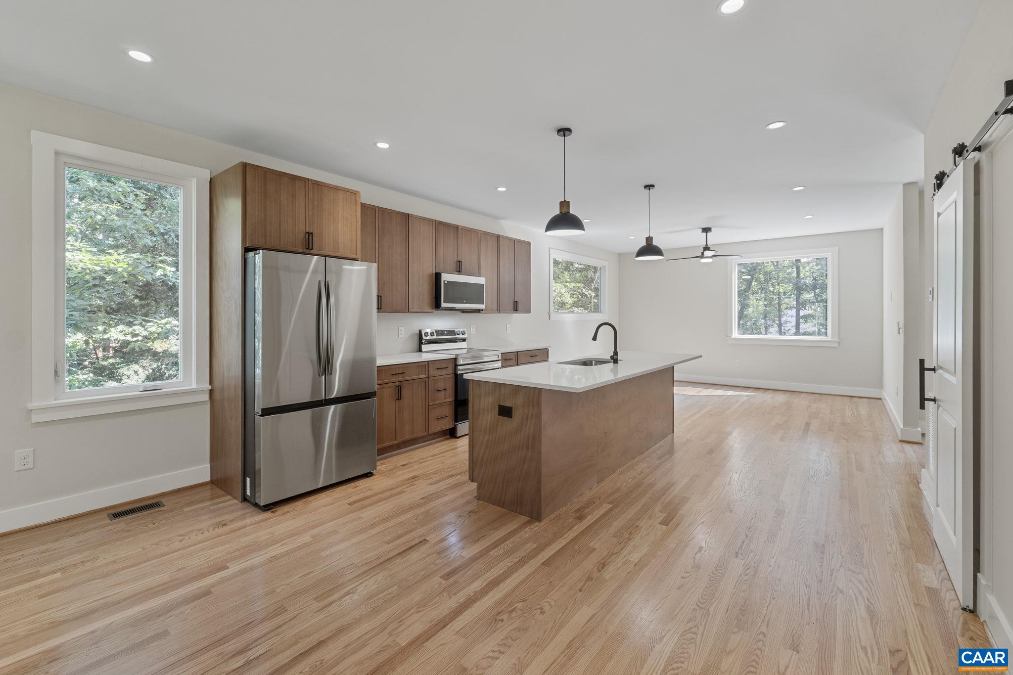 34 Turkeysag Trail Palmyra, VA 22963 - Photo 15 of 53 a kitchen with stainless steel appliances a refrigerator sink and wooden floor