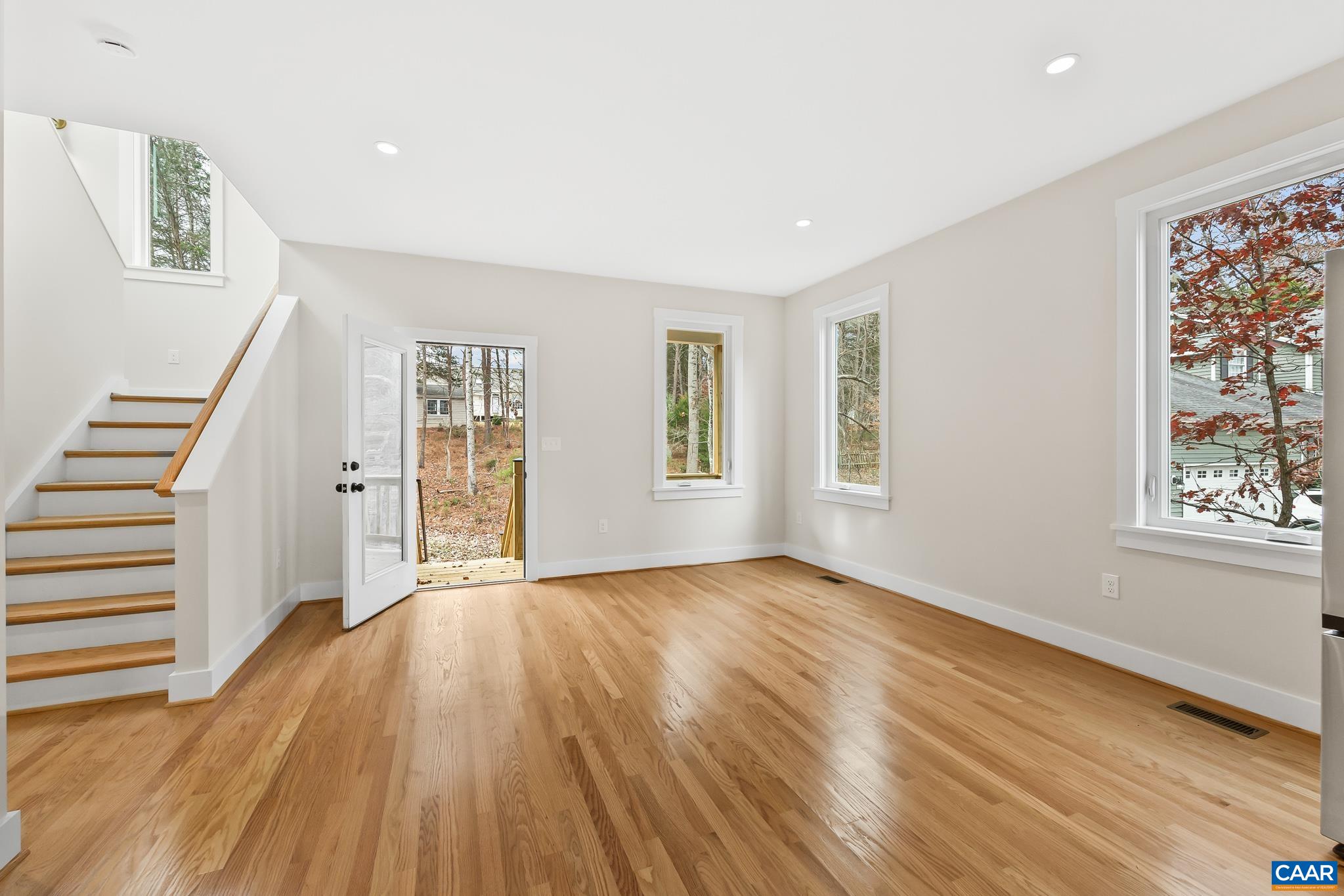 34 Turkeysag Trail Palmyra, VA 22963 - Photo 22 of 53 a view of an empty room with wooden floor and a window