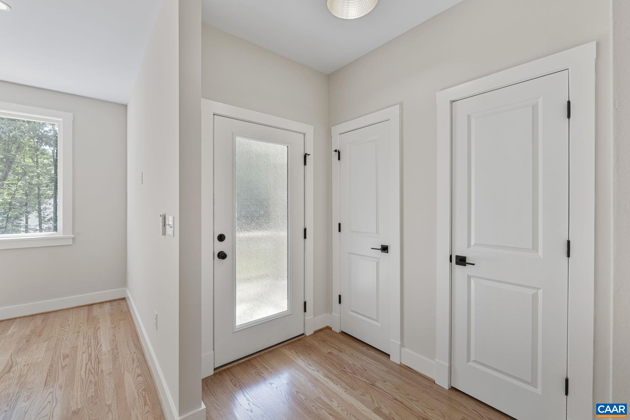 34 Turkeysag Trail Palmyra, VA 22963 - Photo 7 of 53 a view of a hallway with wooden floor