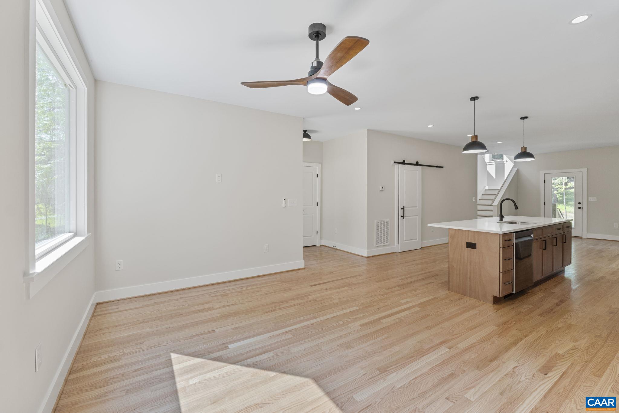 34 Turkeysag Trail Palmyra, VA 22963 - Photo 9 of 53 a view of a kitchen with a sink and wooden floor
