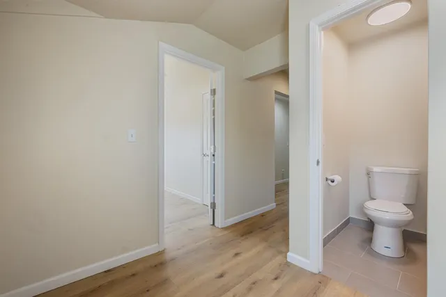 a view of a bathroom with a toilet sink and a shower